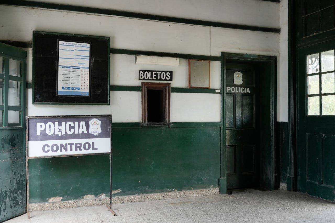 Interior view of an old police office in Uribelarrea, Argentina with ticket window.